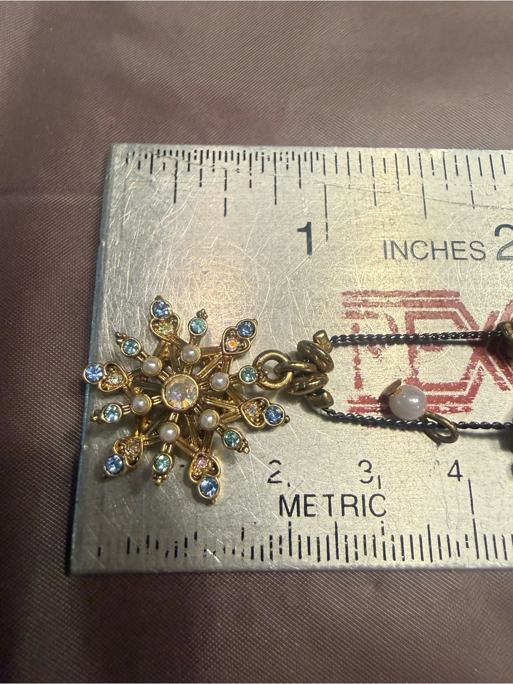 Betsey Johnson Gold Multi-Layer Necklace with Iridescent Hearts & Snowflake - Picture 8 of 8
